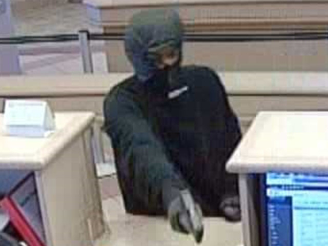 Federal Bureau of Investigation searching for suspects who robbed Dollar Bank in Richmond Heights